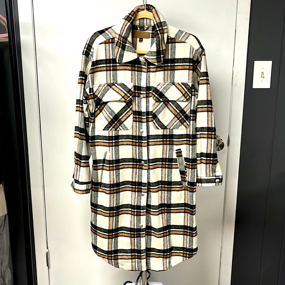 Blank NYC long shacket. Cream with dark green and camel plaid design. $110
